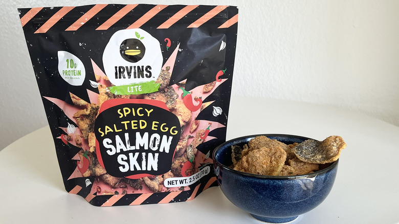 irvins lite spicy salted egg salmon skins in a bowl