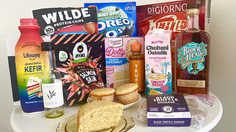 grocery outlet haul with food and beverage items on a table