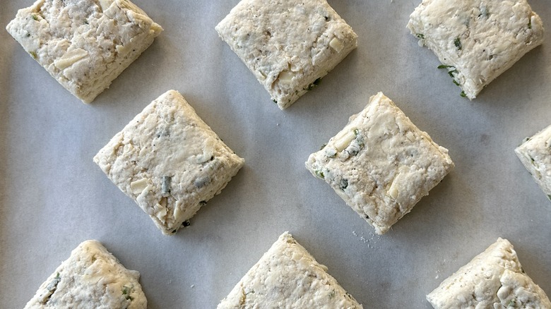 Refrigerated unbaked biscuits on baking sheet