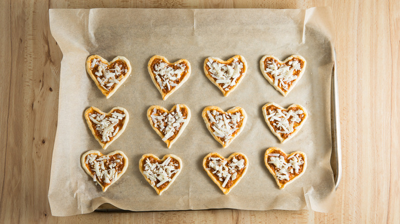 12 pastry hearts on table