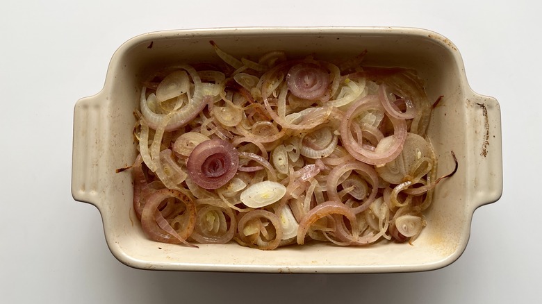 sliced onions in casserole pan