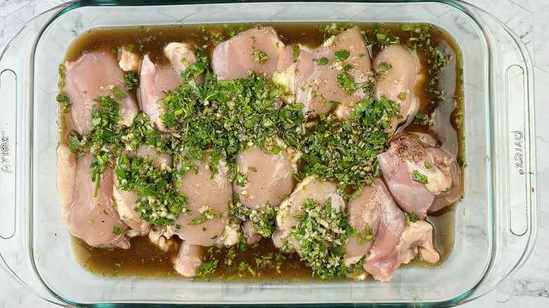 raw chicken in brown marinade