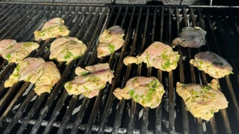 raw chicken on grill