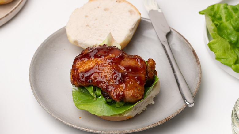 assembling teriyaki chicken sandwich