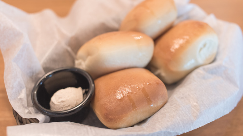 Close-up of Texas Roadhouse bread rolls and butter