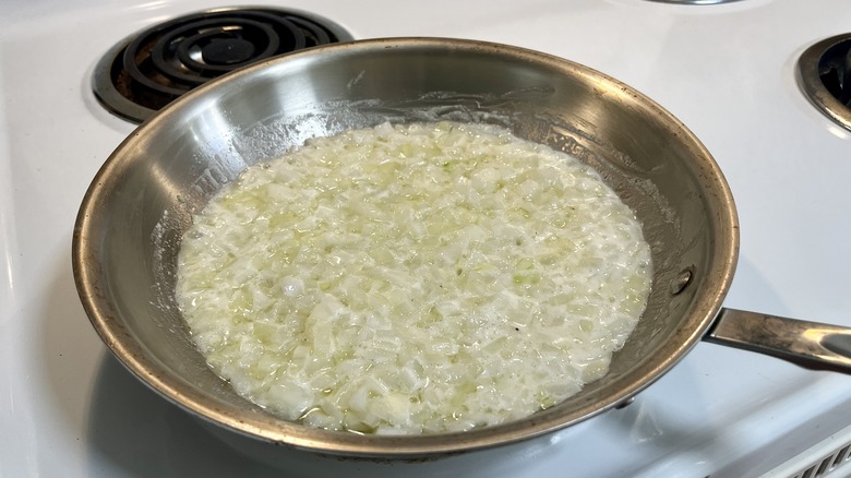 onions in metal frying pan