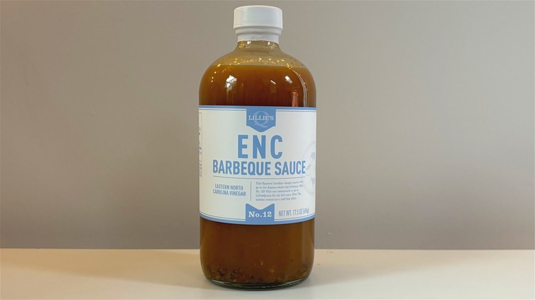 Bottle of Lillie's ENC Barbeque Sauce on white table