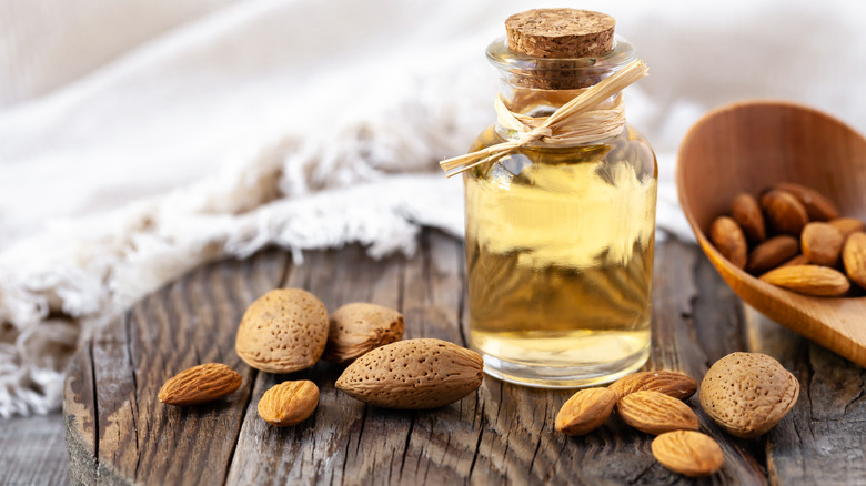 Almonds and bottle of extract