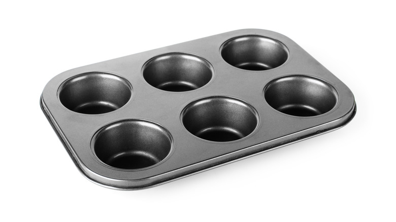 Muffin tray on white background