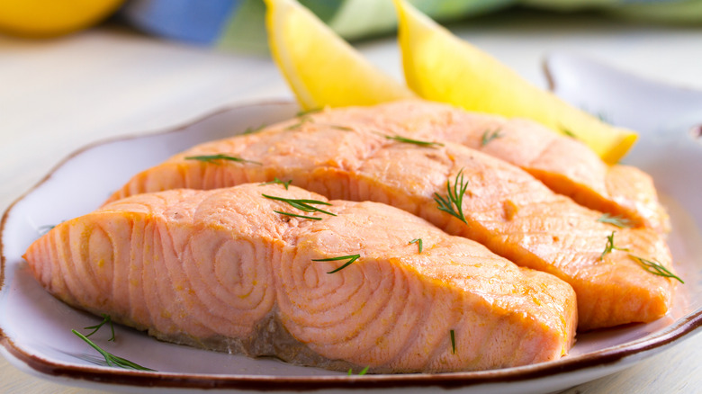 Poached salmon with lemons