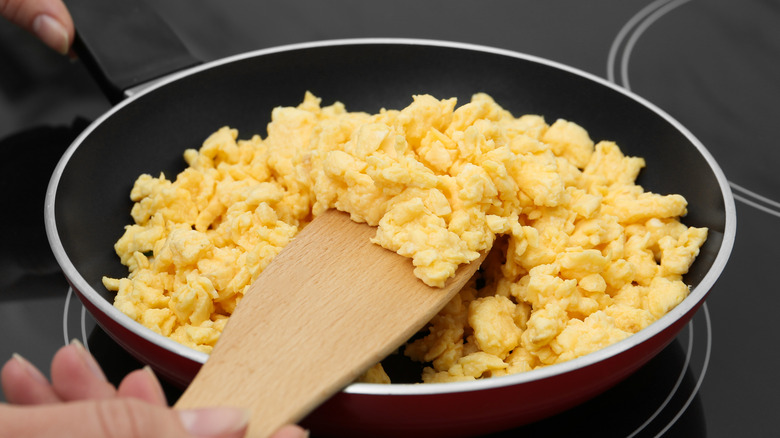 scrambled eggs in frying pan