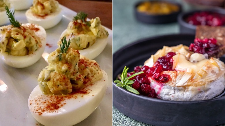 Deviled eggs on a white plate, baked brie in a black bowl with cranberries