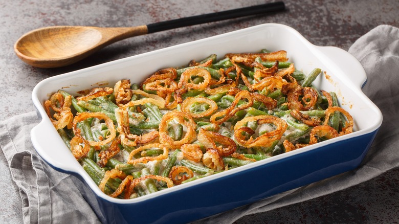 Green bean casserole in a white serving dish