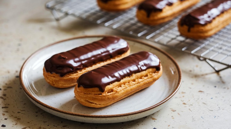 Chocolate éclairs on a plate