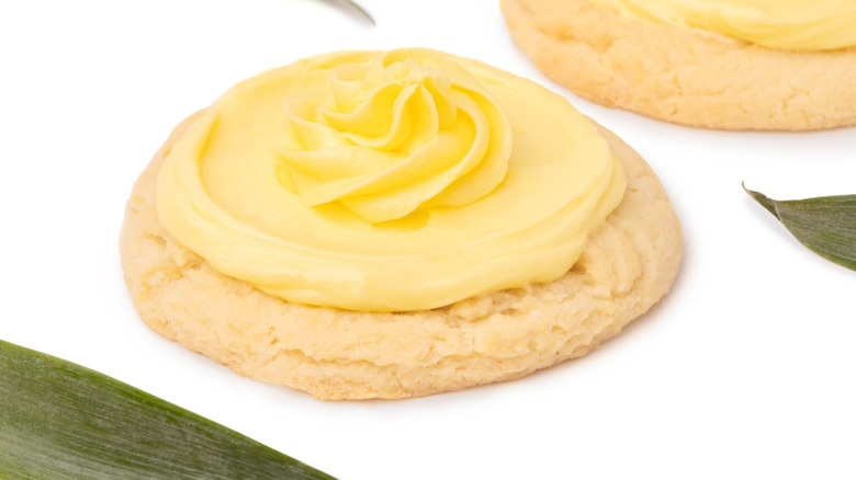 Yellow pineapple flavored cookie topped with yellow frosting