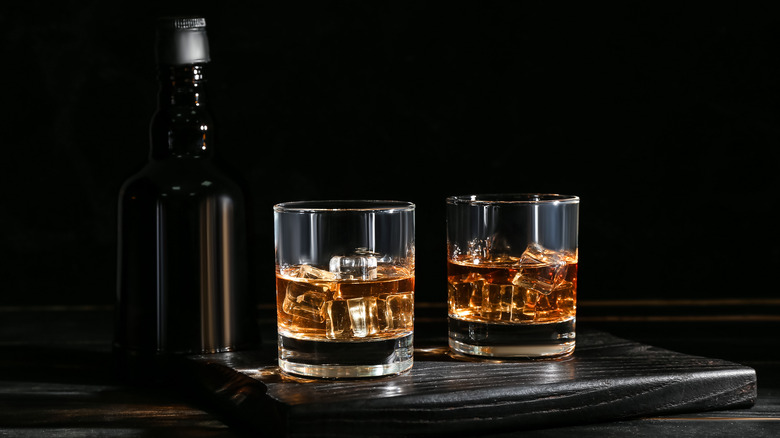 Bourbon bottle and rocks glasses