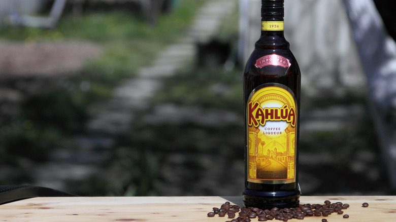 Kahlua bottle and coffee beans
