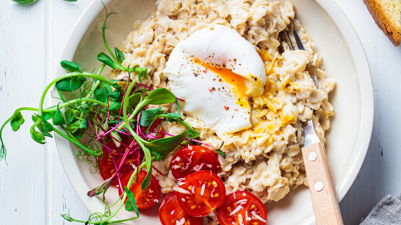 oatmeal topped with poached egg