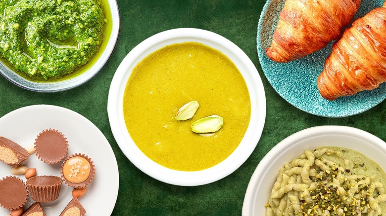 A composite image with pistachio paste in the middle surrounded by pistachio pesto, chocolate cups, croissants, and pistachio pasta