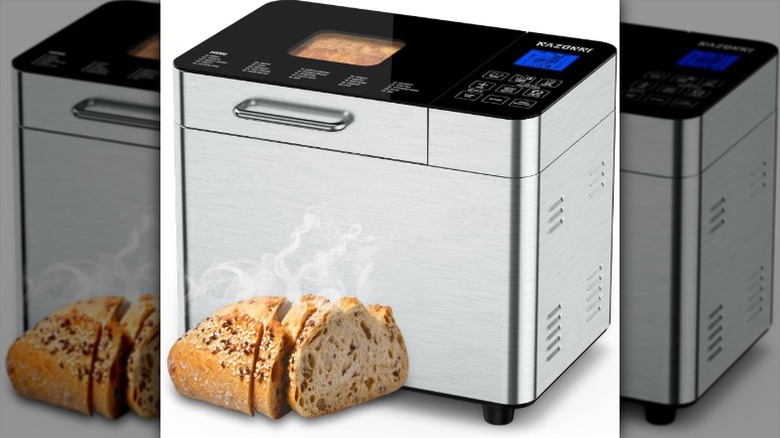 Razorri bread maker machine next to whole grain bread loaf