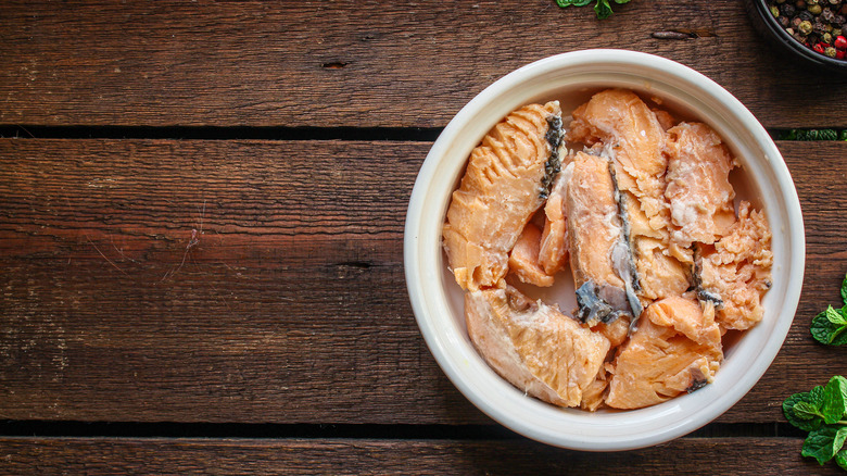 Canned salmon in white bowl