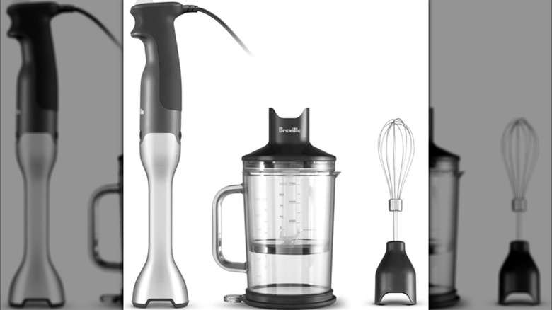 Breville hand blender with whisk and measuring cup on white background