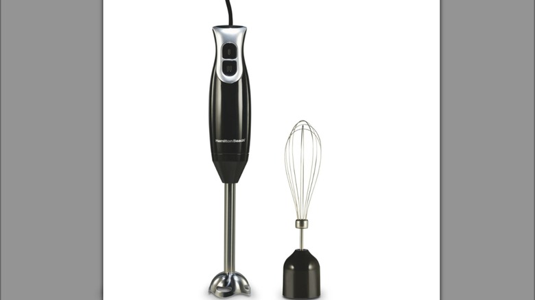 Black Hamilton Beach corded immersion blender and whisk attachment on white background