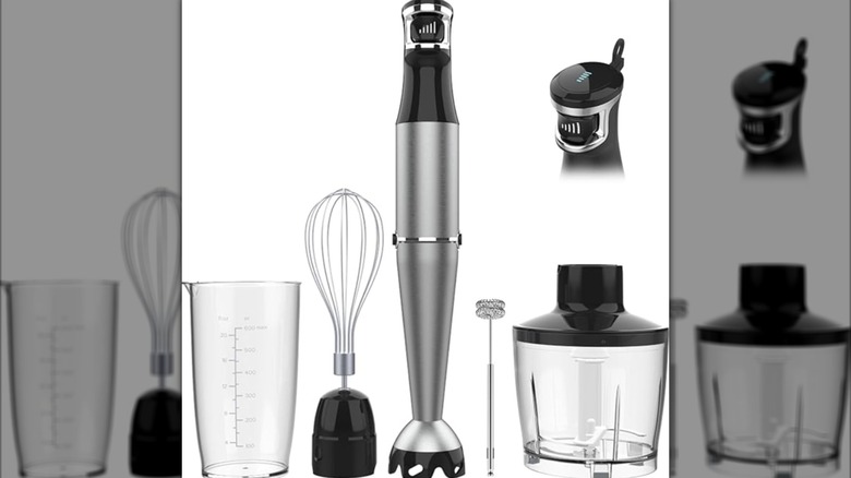 Stainless steel hand blender and various attachments on white background