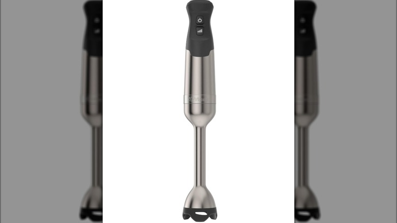 Stainless steel Vitamix hand blender with black rubber trim on white background