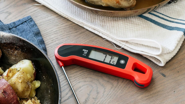 Javelin Pro Duo thermometer shown on counter with cooked chicken and potatoes