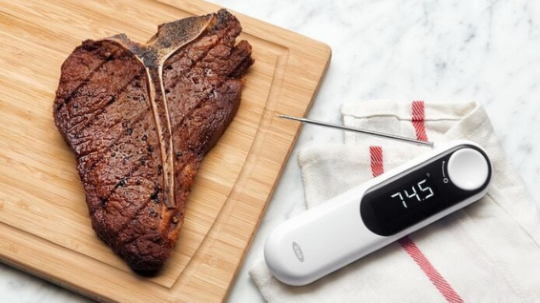 T-bone on cutting board with Oxo Thermocouple Thermometer