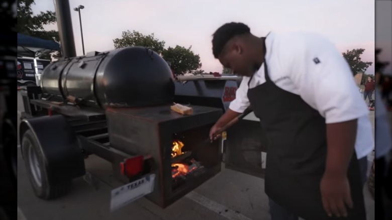 Teenager cooking on BBQ High