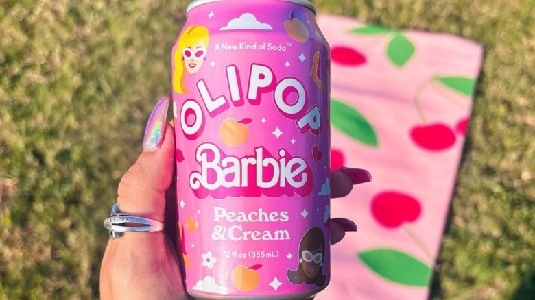 Olipop Barbie peaches and cream soda with pink details