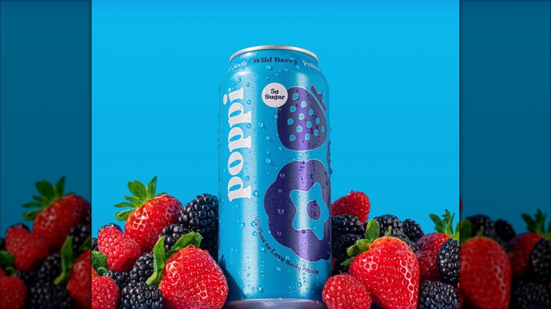 Wild Berry Poppi flavor surrounded by real berries.