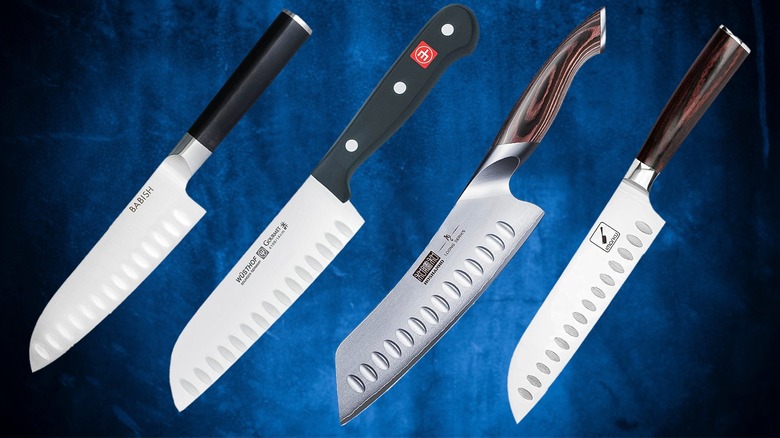 Four knives on blue background