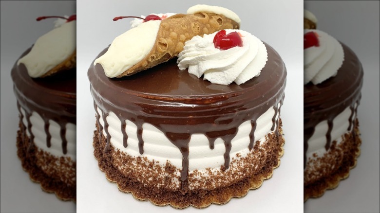 Cake topped with cannoli