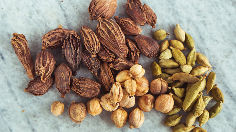 black, white, and green cardamom