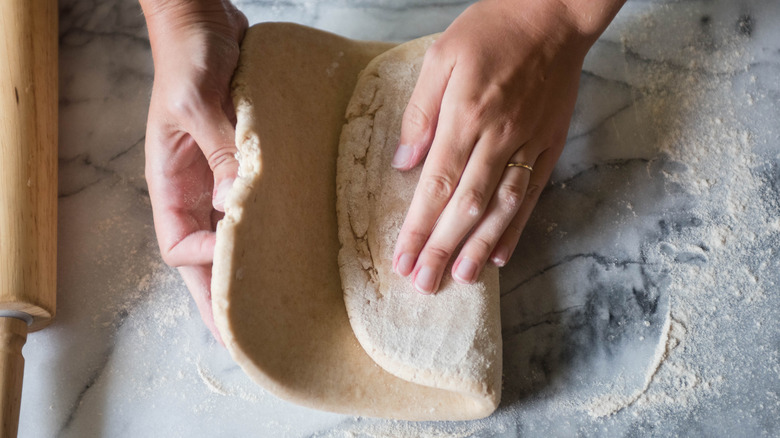 Folding laminated croissant dough