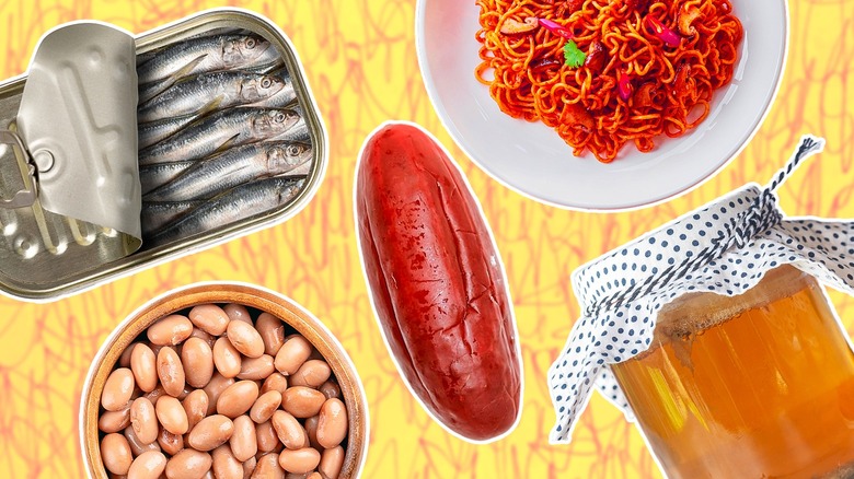 Tinned fish, chamoy pickle, kombucha, Buldak plate, and canned beans against a yellow background