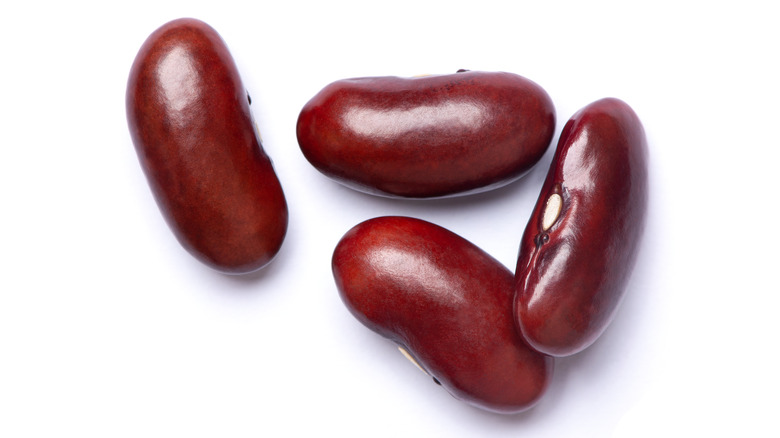 four kidney bean close up white background