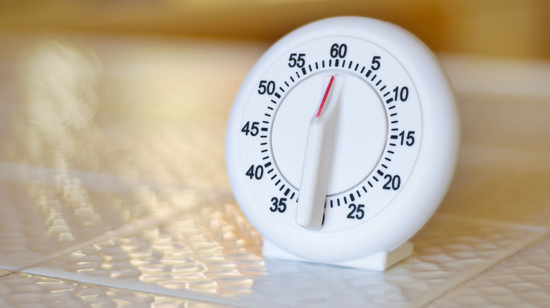 White kitchen timer on counter