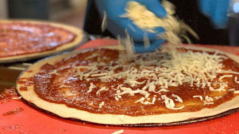 large cheese pizza on plate