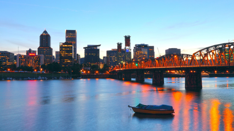 A twilight view of Portland lit up from the water