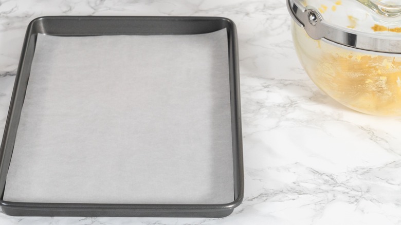 Parchment paper on metal pan