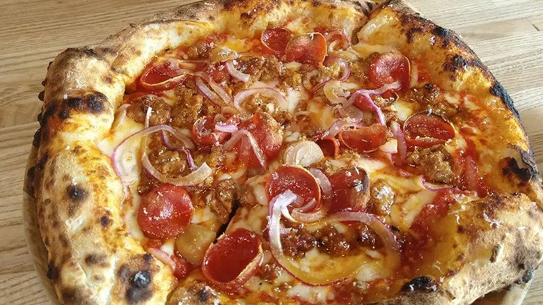 Meat and onion pizza