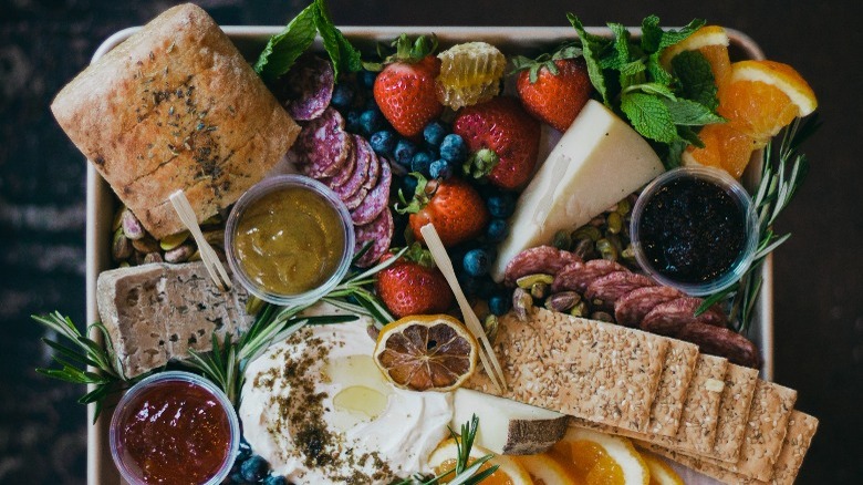 A charcuterie sheet pan board