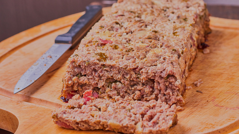 Cut meatloaf on board