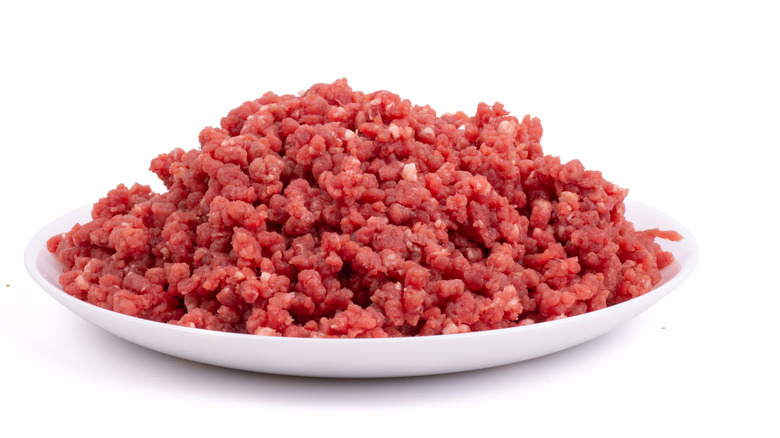 Raw minced beef on plate