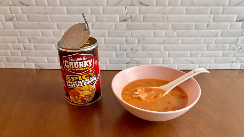 Cambell's soup can next to bowl of gumbo