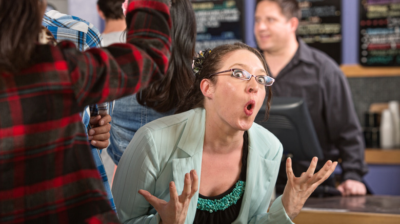 Demanding coffee shop patron